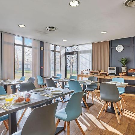 Appart'Hotel Odalys City - Bioparc Lyon Est Bagian luar foto